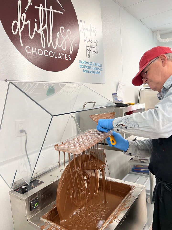 Chocolatier Stan Kitson creates handmade milk chocolate bonbons.